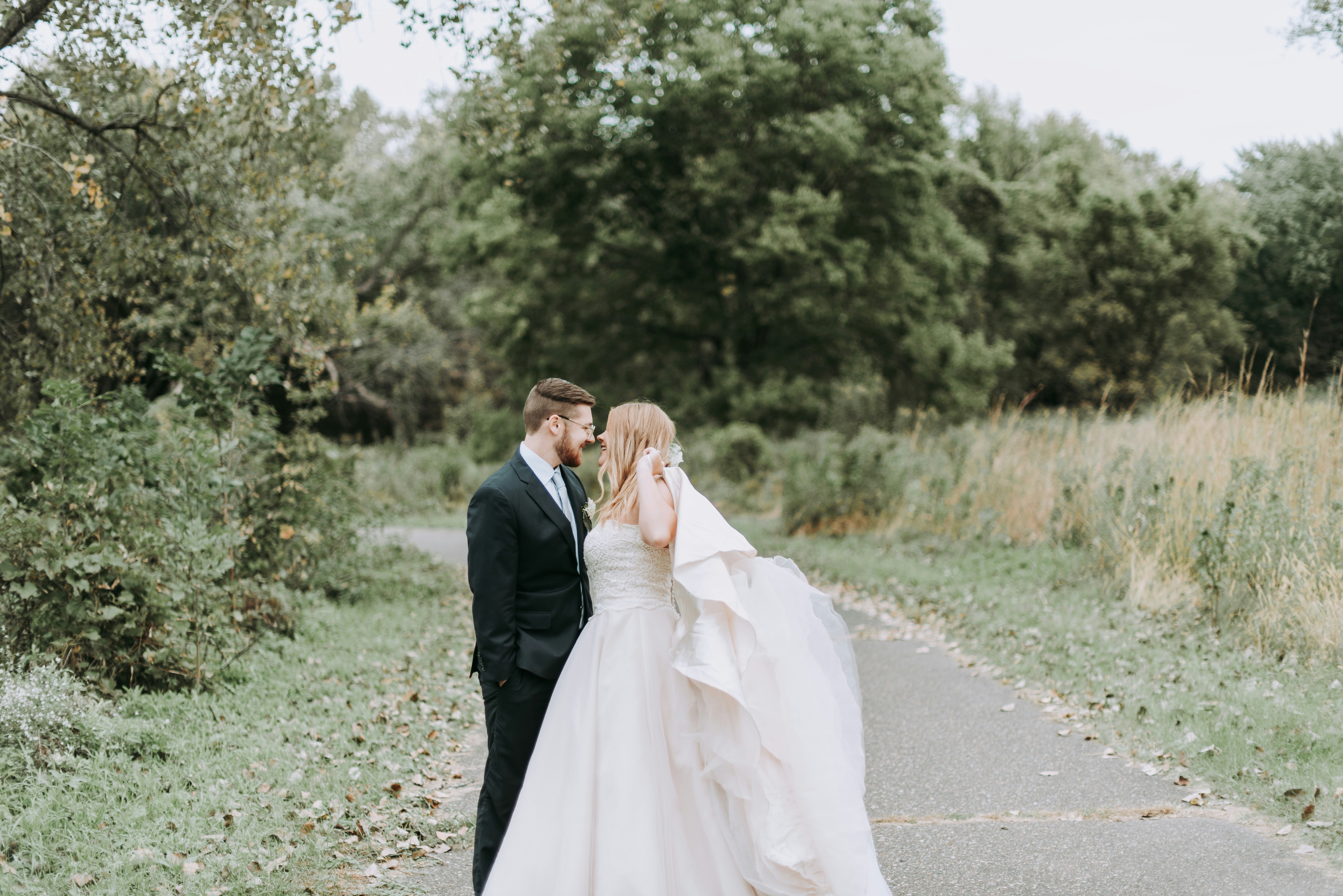 groom and bride on pavement